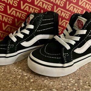 Vans Black and White High-Top Sneakers with Iconic Jazz Stripe